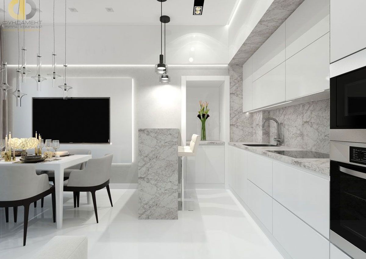 A luxurious modern kitchen where water-using appliances and marble surfaces are protected from hard water scale and staining by a whole-house water filtration system.
