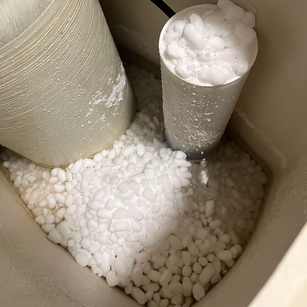An essential yearly task in the water softener maintenance checklist: cleaning the brine tank.